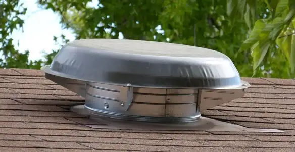 attic fan installation services with low-profile roof ventilation unit in Peoria, IL