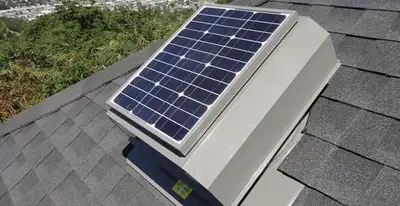 attic fan installation services with energy-efficient roof-mounted ventilation system in Peoria, IL