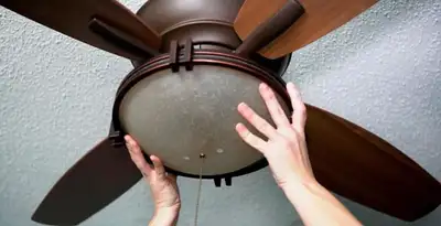 Ceiling fan repair and reinstallation on ceiling mount in Peoria, IL