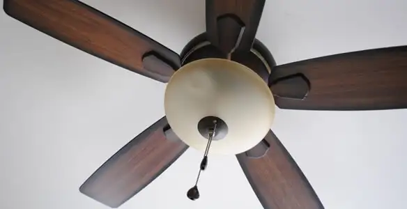 Fully installed ceiling fan with balanced blades and light fixture in Peoria, IL