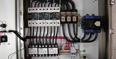 Electrical panel installation with organized circuit breakers and wiring in Peoria, IL