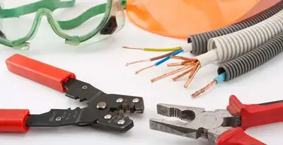 Electrical wiring repair with professional tools and safety equipment in Creve Coeur, IL