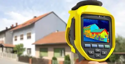 home energy audit service performing exterior thermal inspection to identify energy loss in Peoria, IL