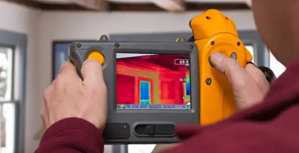home energy audit service capturing thermal readings to analyze insulation and electrical efficiency in Peoria, IL