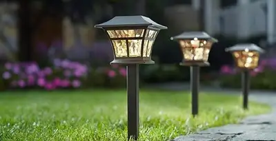 landscape lighting installation services with professionally installed pathway lights in Peoria, IL