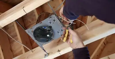 Professional recessed lighting installation with electrical wiring by licensed electricians in Peoria, IL