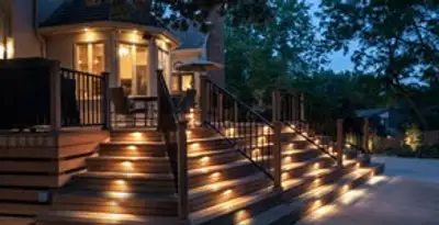 Residential electrician installing outdoor lighting for home safety in Peoria, IL
