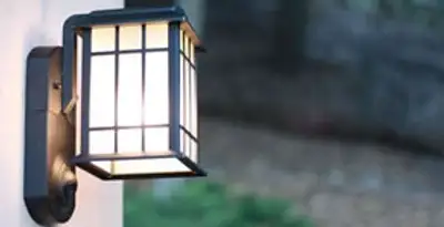 security light installation services with professionally mounted exterior wall light in Peoria, IL