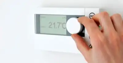 Thermostat installation service with professional adjusting temperature control in Peoria, IL