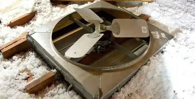 whole house fan installation services with attic-mounted ventilation unit in Peoria, IL